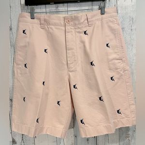 Men’s J Crew pale pink cotton shorts with navy sailfish.